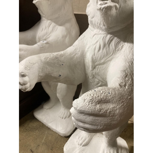 2 - A pair of painted bear reconstituted stone garden pot holders, 97cm high
