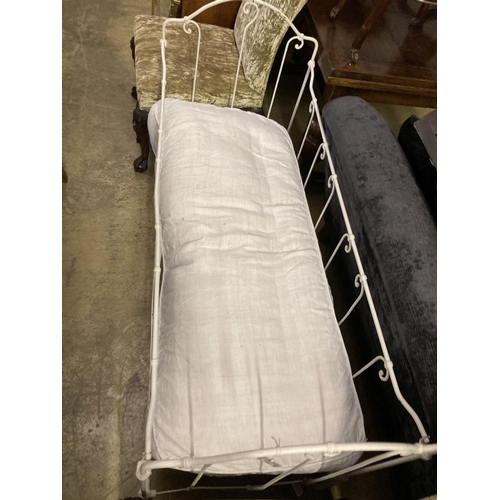 21 - A 19th century French painted wrought iron crib, length 140cm, depth 59cm, height 90cm