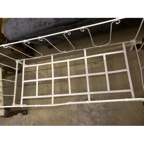 21 - A 19th century French painted wrought iron crib, length 140cm, depth 59cm, height 90cm