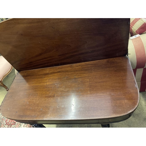 24 - A Regency D shape mahogany folding tea table, width 93cm, depth 45cm, height 74cm