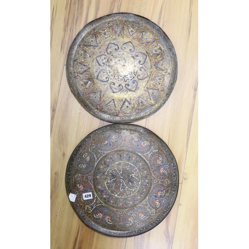 429 - A pair of Islamic enamelled brass trays, diameter 38cm