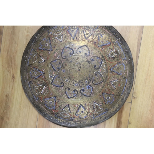 429 - A pair of Islamic enamelled brass trays, diameter 38cm
