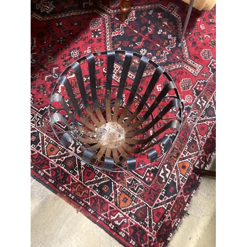 59 - A wrought iron circular brazier, approx. 53cm wide, height 54cm