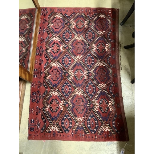 102 - A pair of Caucasian red ground rugs, 154 x 97cm