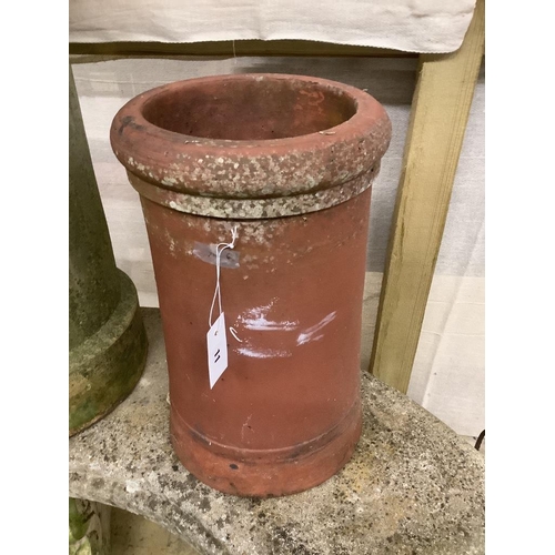 11 - Two pottery chimney pots, larger 76cm high