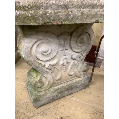 12 - A reconstituted stone curved garden seat, length 110cm, depth 44cm, height 44cm