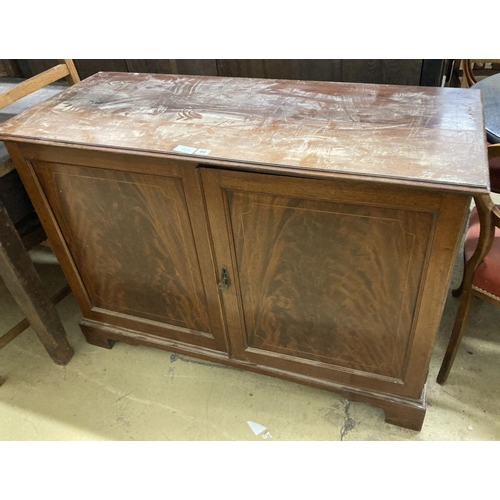 121 - An Edwardian mahogany two door cabinet, length 122cm, depth 51cm, height 86cm