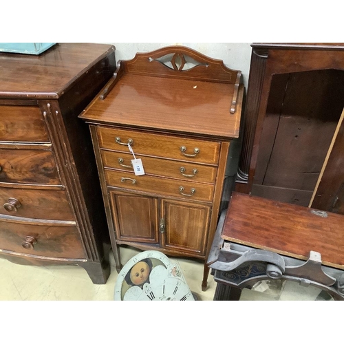 130 - An Edwardian satinwood banded mahogany music cabinet, width 53cm, depth 38cm, height 115cm... 