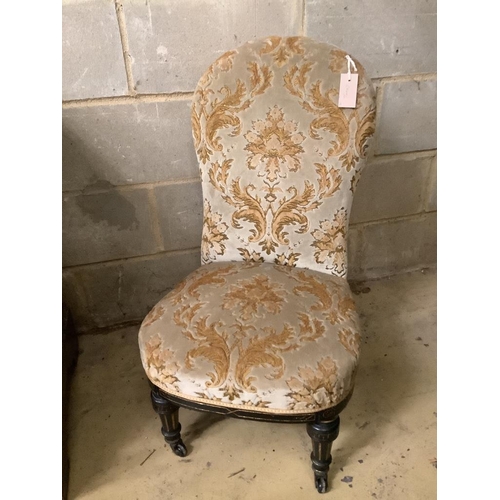 142 - A Victorian ebonised and gilt upholstered nursing chair and pair of balloon back chairs