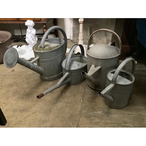 150 - Two galvanised tubs, larger width 80cm, together with four watering cans