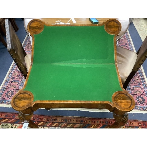 156 - A Queen Anne revival walnut concertina folding card table, stamped Gill and Reigate, London retailed... 