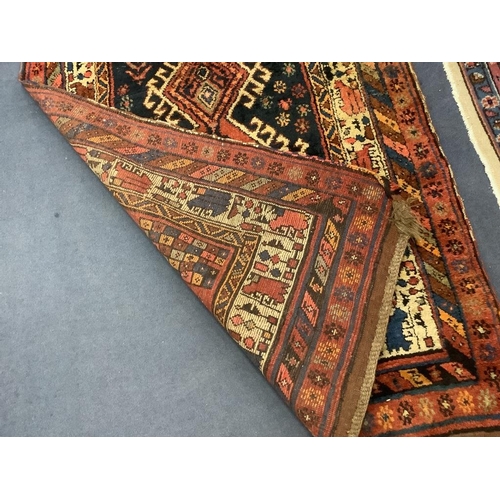 163 - An Eastern blue ground runner, 440 x 105cm