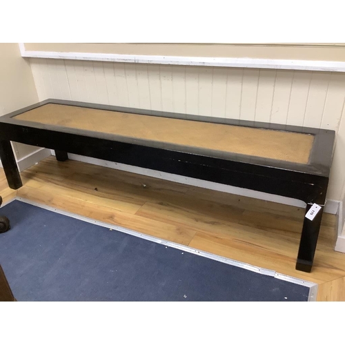 175 - A Chinese lacquer caned bench, length 208cm, width 55cm, height 54cm