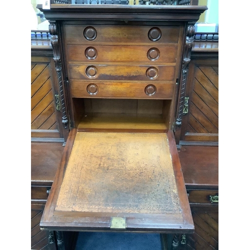 186 - A late Victorian mahogany kneehole desk with fall front, width 151cm, depth 74cm, height 174cm... 