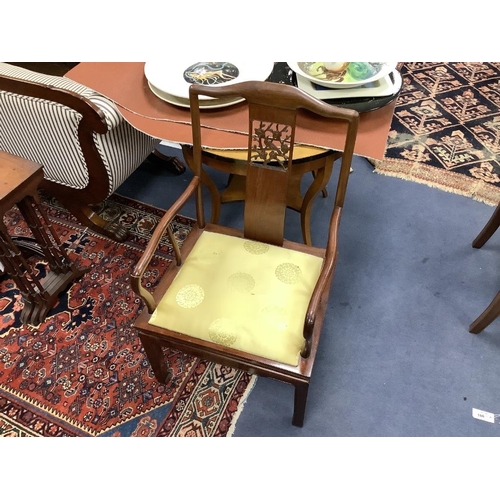 192 - A 20th century Chinese carved hardwood dining room suite comprising sideboard fitted with four drawe... 