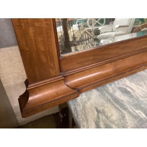 20 - An early 20th century mahogany overmantel mirror, width 144cm, height 77cm