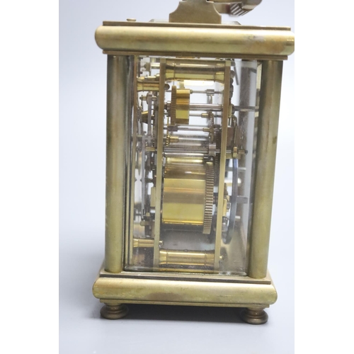 204 - An E. Maurice & Co hour repeating carriage clock, height 16cm with handle down