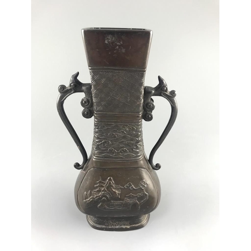 205 - A Chinese bronze two handled flower vase, Ming dynasty,24.5cm