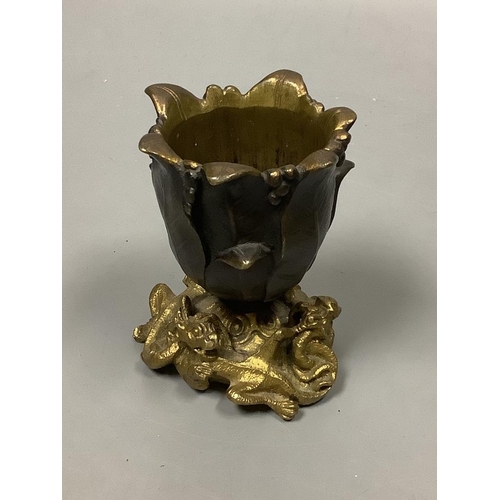 207 - A small bronze 'tulip head' vase with gilt 'dragon' base, height 9cm