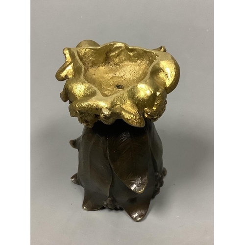 207 - A small bronze 'tulip head' vase with gilt 'dragon' base, height 9cm