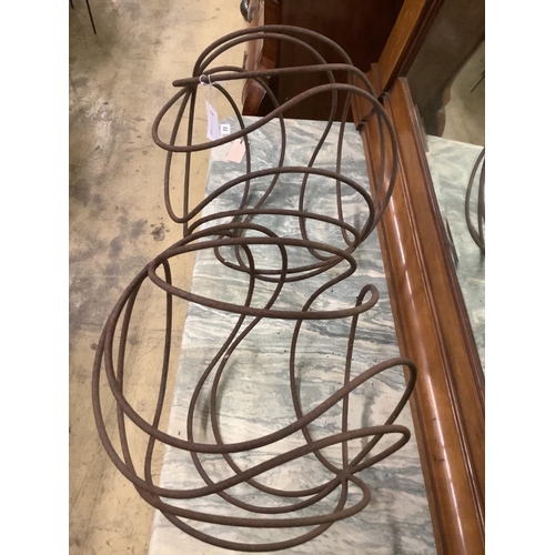 21 - A pair of ball shaped wrought iron growing frames, 40cm diameter