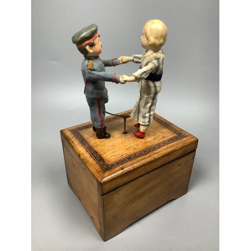 220 - An early 20th century German musical dancing doll automaton, height 23cm