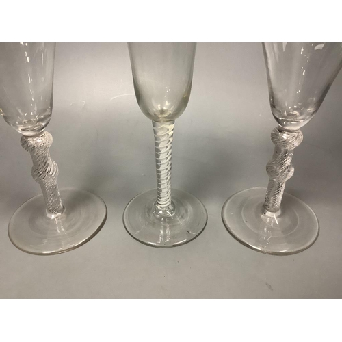 223 - A George III double series opaque twist ale glass and pair of George III style air twist wine glasse... 