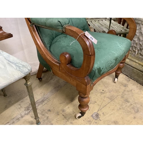 23 - A mid Victorian upholstered mahogany armchair, width 66cm, depth 70cm, height 94cm