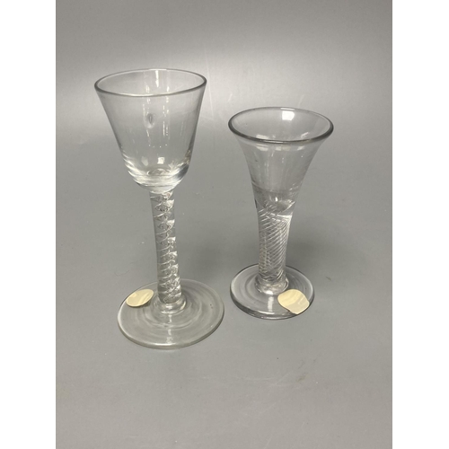 231 - Two George II mercurial air twist stem cordial glasses, c.1750-5, with funnel and drawn trumpet bowl... 