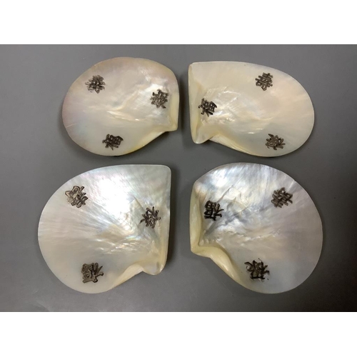 232 - A set of four Chinese mother of pearl dishes, approx. length 11.5cm