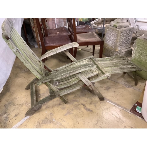 24 - A weathered teak folding garden steamer chair