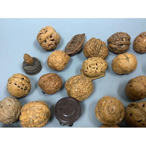 240 - Various Chinese carved walnut shells