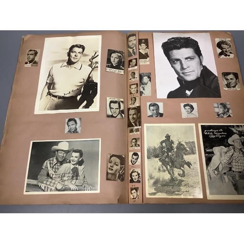 245 - A Film Star scrapbook, containing a collection of photographs of 20th century actors,various sizes, ... 