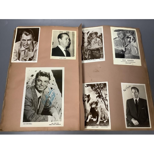 245 - A Film Star scrapbook, containing a collection of photographs of 20th century actors,various sizes, ... 