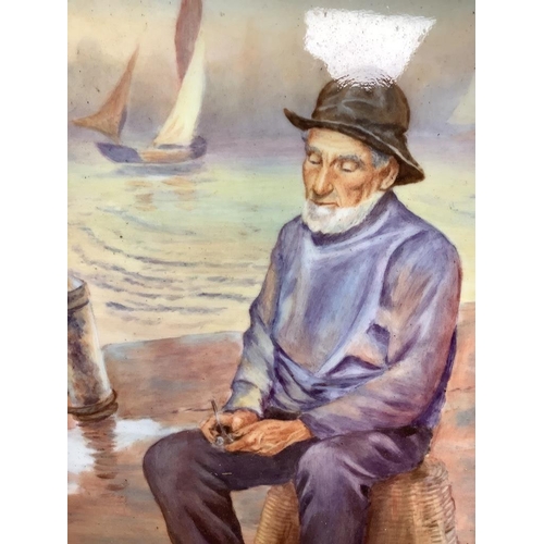 251 - A framed porcelain plaque painted by Francis Clark, depicting a fisherman smoking his pipe17.5x13cm ... 