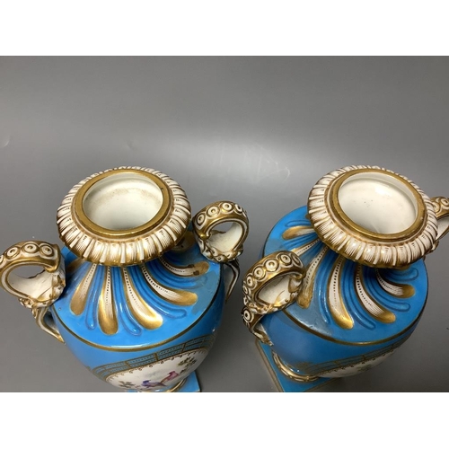 253 - A pair of mid 19th century Coalport turquoise ground two handled vases, painted in Sévres style with... 