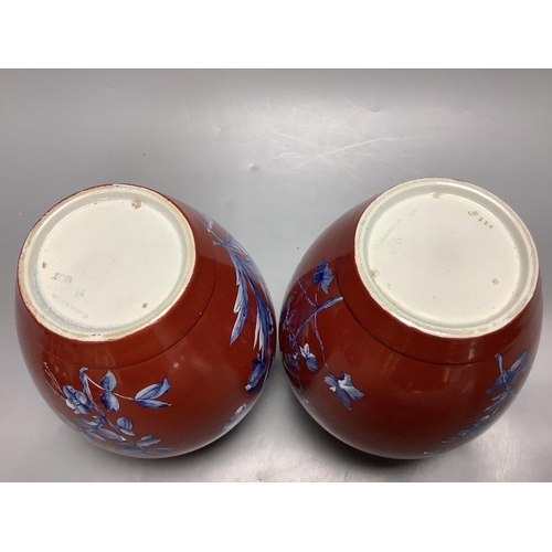 257 - A pair of Victorian Wedgwood vases and covers25cm