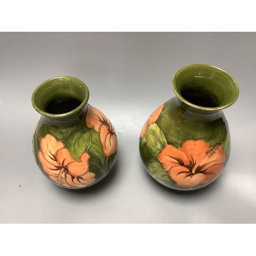 273 - Two Moorcroft Hibiscus vases and another, similar, tallest 21cm