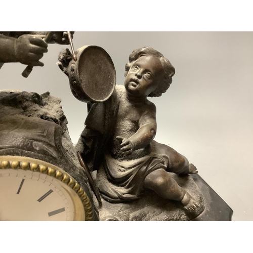 276 - An early 20th century French spelter and slate cherub mantel clock, height 34cm