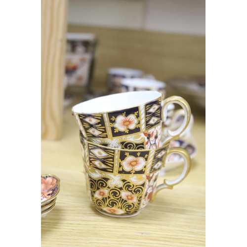 284 - A collection of Royal Crown Derby Imari patterned ceramics including cups, side plates and platter... 