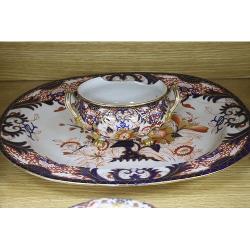 284 - A collection of Royal Crown Derby Imari patterned ceramics including cups, side plates and platter... 