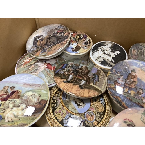 302 - A collection of Prattware pot lids and bases (approx 19)