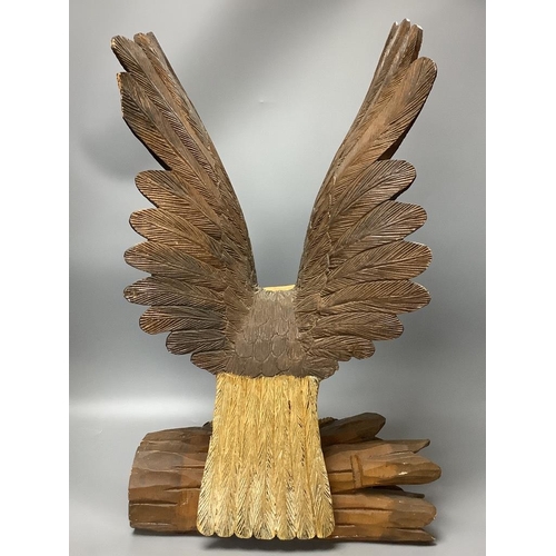 306 - A carved wood eagle, height 61cm