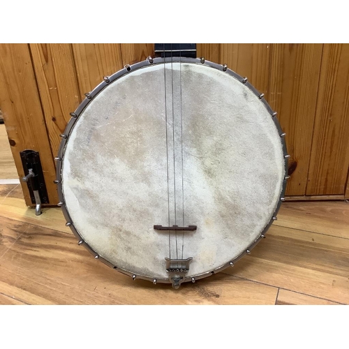 309 - A cased banjo, unmarked