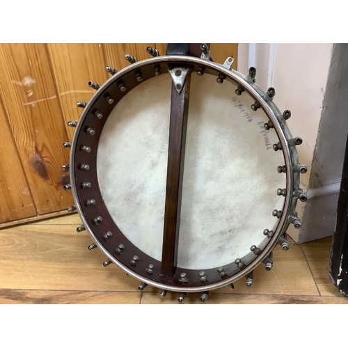 309 - A cased banjo, unmarked