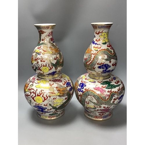 310 - A pair of Chinese famille rose double gourd-shaped vases, height 40cm