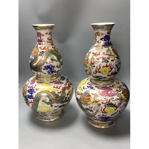 310 - A pair of Chinese famille rose double gourd-shaped vases, height 40cm