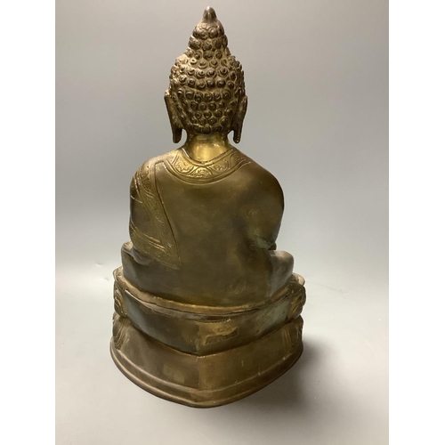 333 - A bronze figure of a seated Buddha and a Japanese blue and white ovoid vase, of 'sack' form with app... 