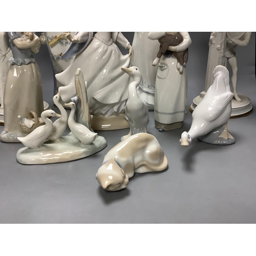 359 - A quantity of Lladro, Nao and similar style figures