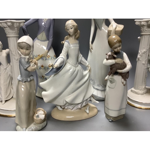 359 - A quantity of Lladro, Nao and similar style figures